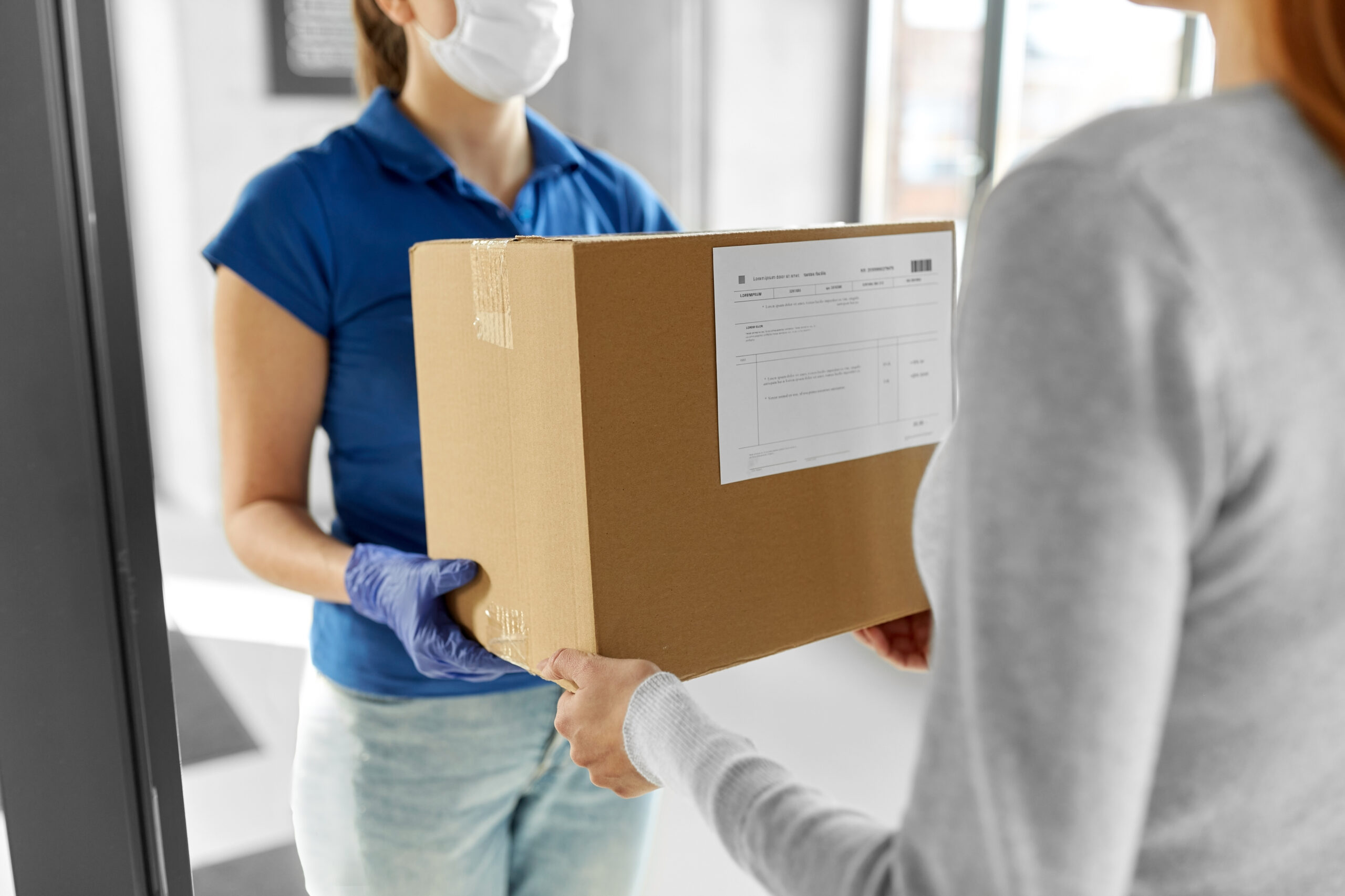 Delivery Girl Face Mask Giving Parcel Woman Scaled
